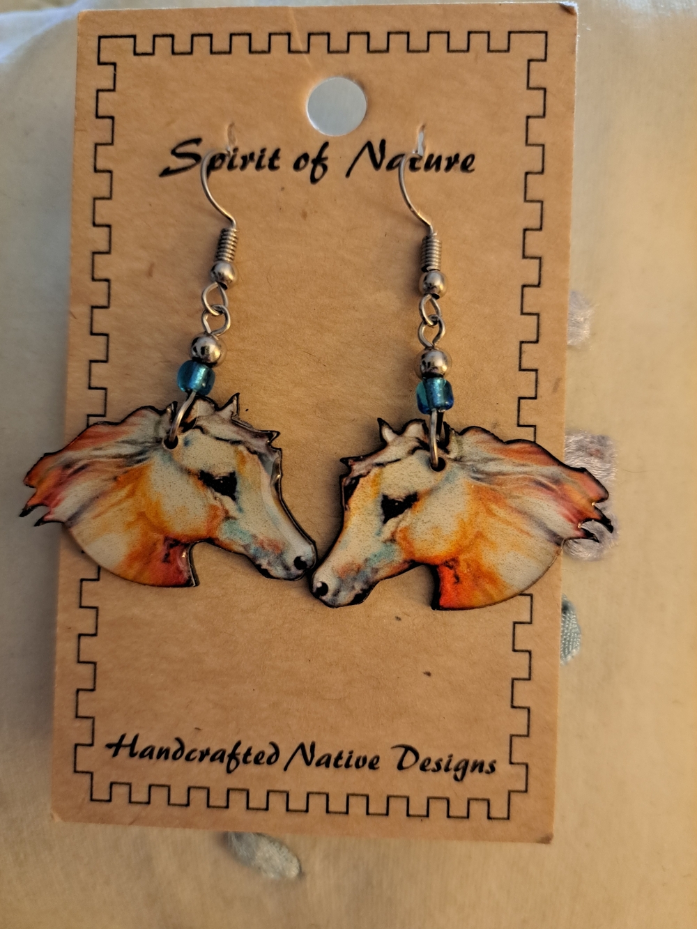 Handcrafted Horse Head Necklace in Orange and Blue, bought from a boutique in NM
